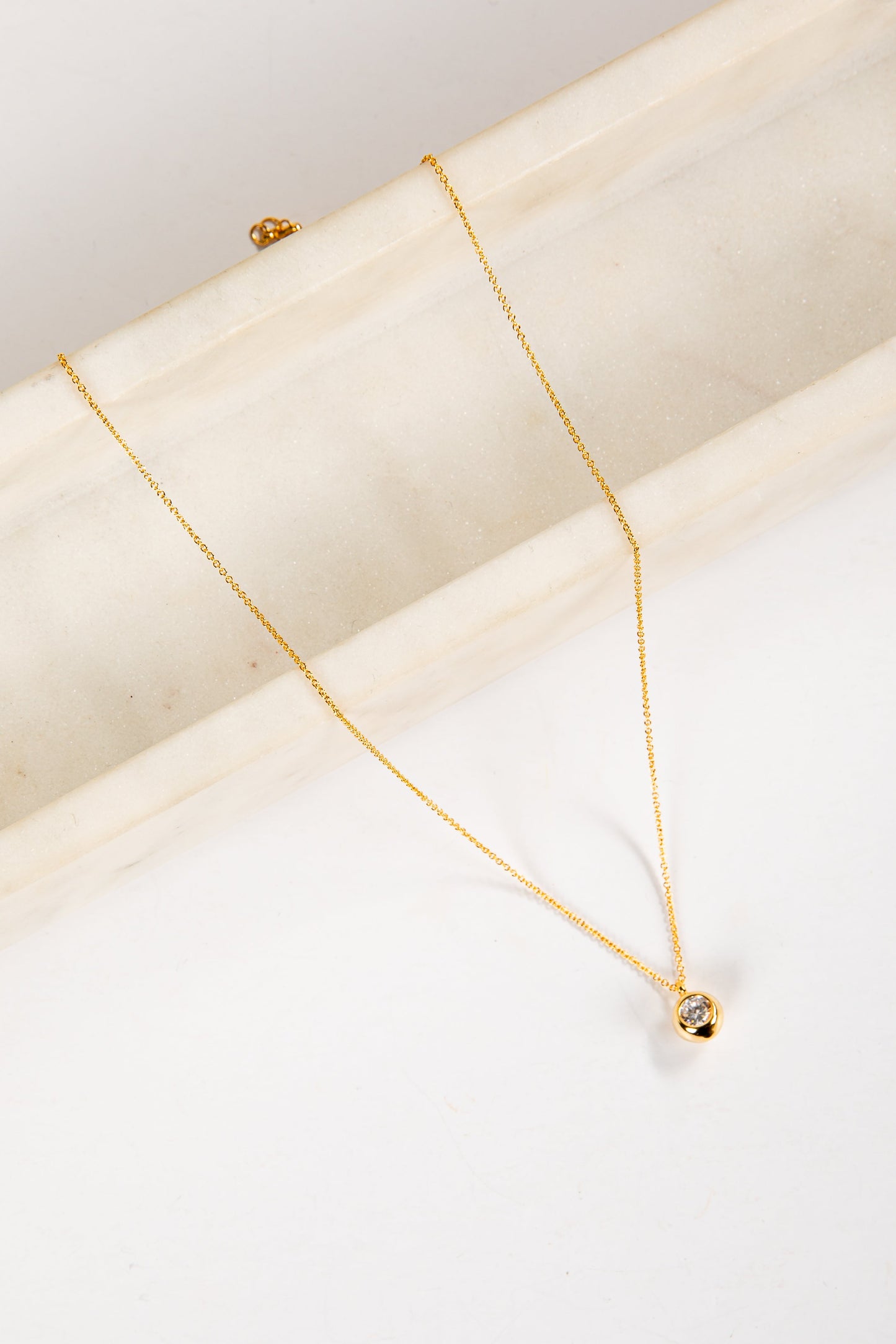 Daphne Gold Rhinestone Ball Charm Necklace